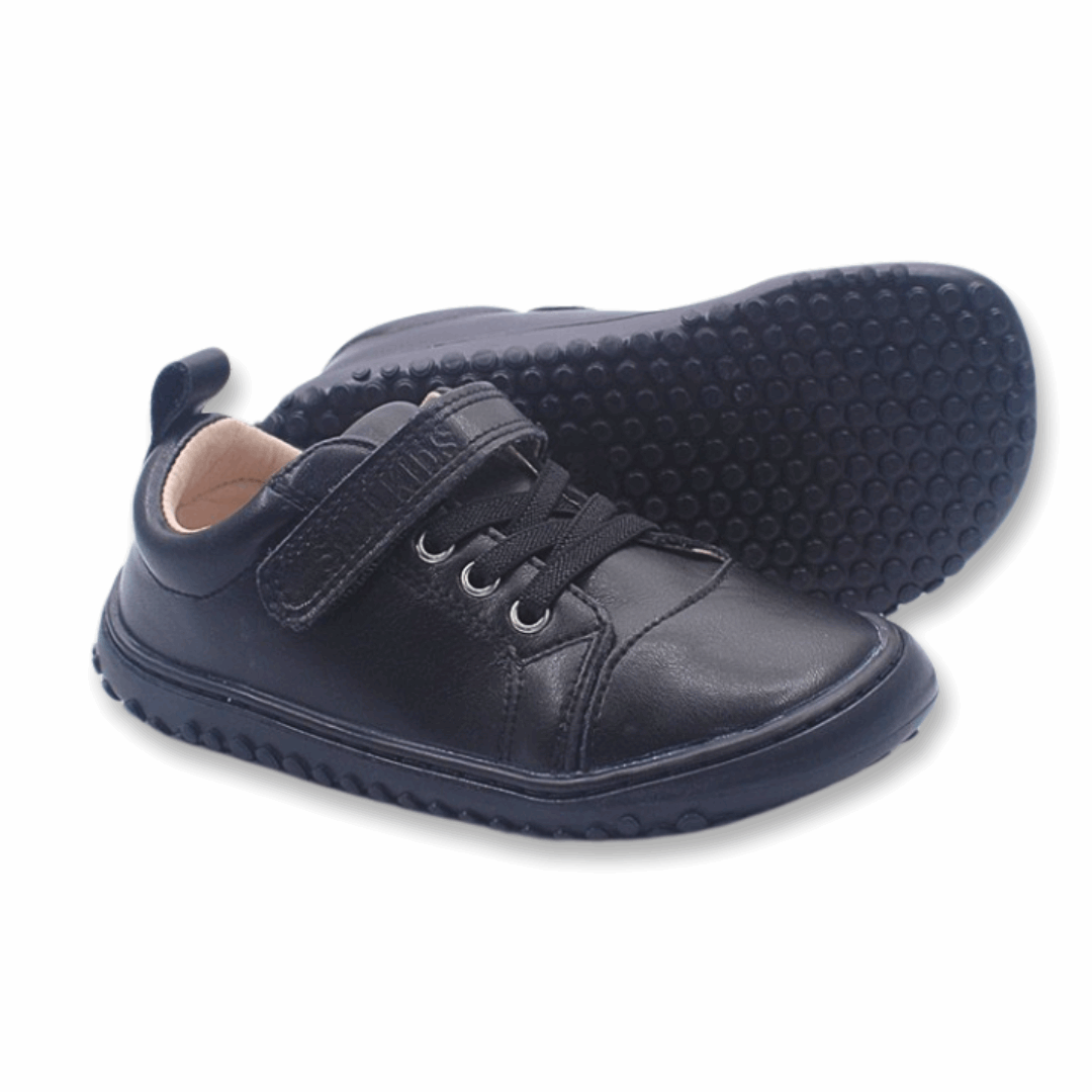 Zapatilla Ergonomica barefoot Escolar Aconcagua 2 color Negro para niños unisex vista lateral + suela 