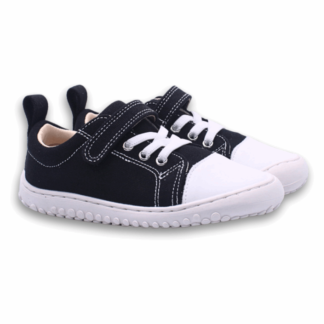 Zapatilla Ergonomica barefoot aconcagua 2 lona Negra para niños unisex vista lateral ambos pies