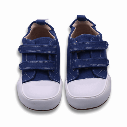 Zapatilla ergonómica barefoot Oasis Lona Jeans punta blanca unisex vista frontal ambos pies.