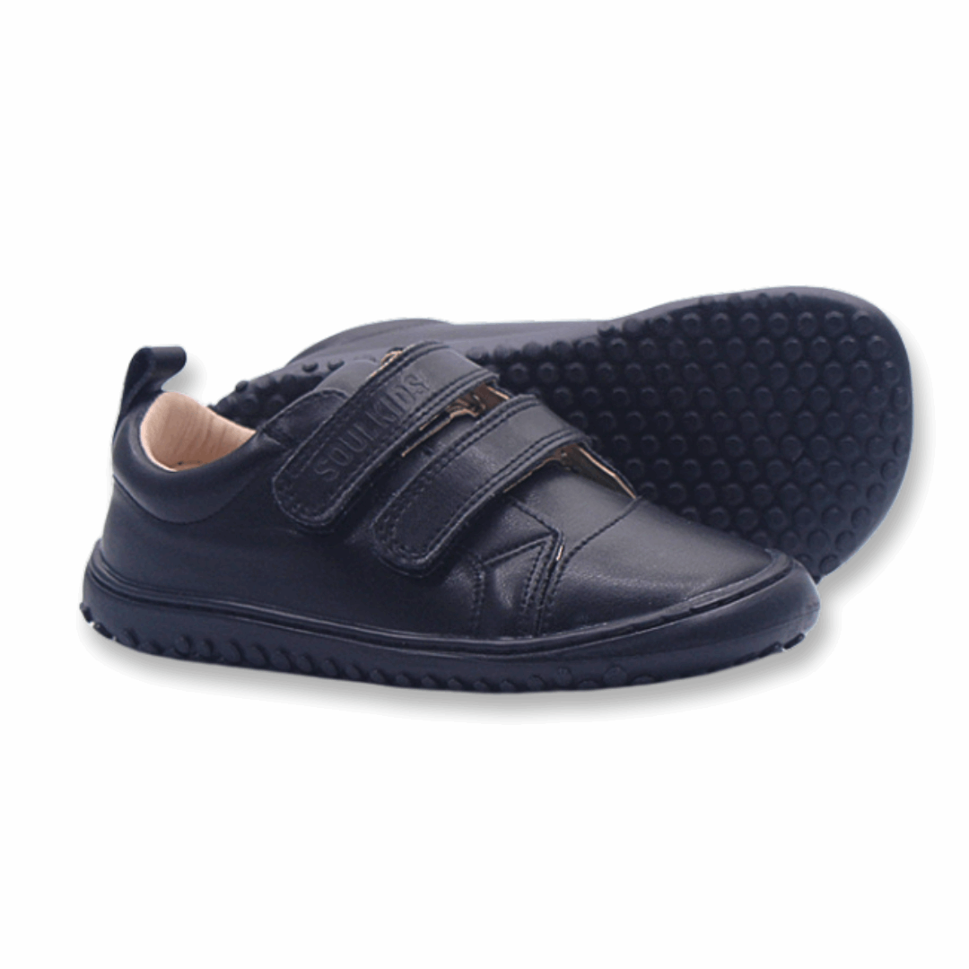 Zapatilla ergonómica barefoot escolar Aconcagua C2 negro para niños unisex vista lateral suela y zapatilla