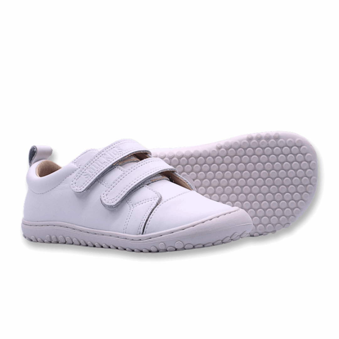 Zapatilla ergonómica barefoot escolar Aconcagua C2 blanco para niños unisex vista lateral zapatilla y suela 