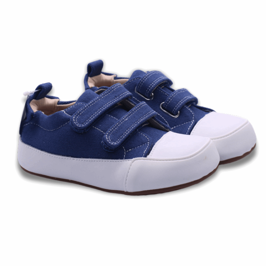 Zapatilla ergonómica barefoot Oasis Lona Jeans punta blanca unisex vista en Diagonal ambos pies.